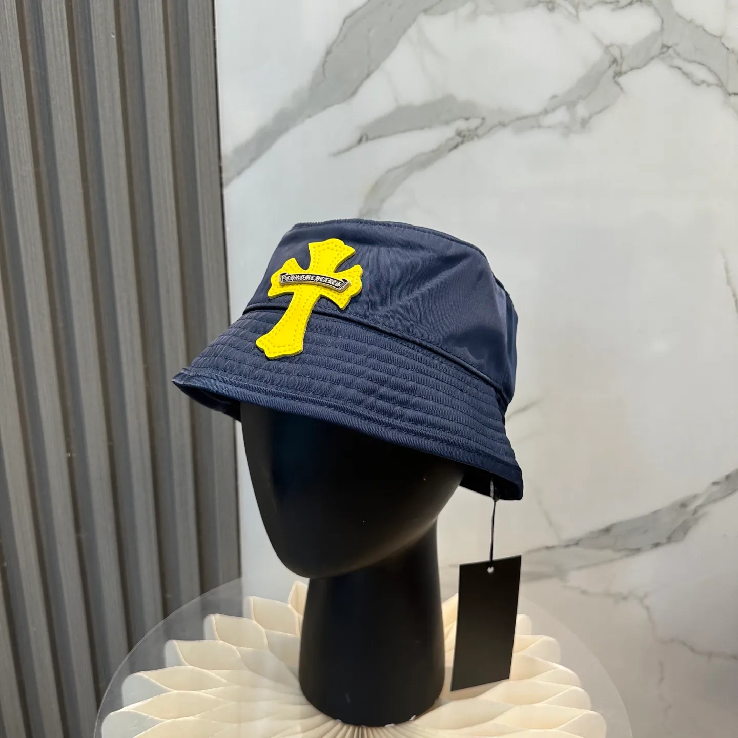 P70 Chrome Hearts CH Crank Bait Navy leather cross fisherman hat, same style for men and women. Custom-woven and dyed navy blue and yellow nylon fabrics, hand-cut imported colorless yellow crosses, and 925 silver scrolls.